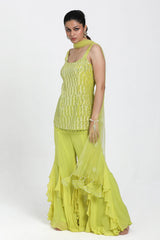 Himani Seth in Neon Yellow Straight Suit With Frill Inserted Sharara & Dupatta