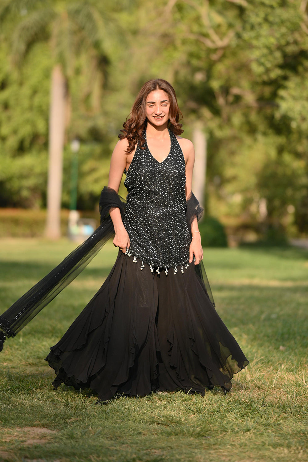 Gargi Singh in Black Halter Neck Straight Suit With Inserted Sharara Set