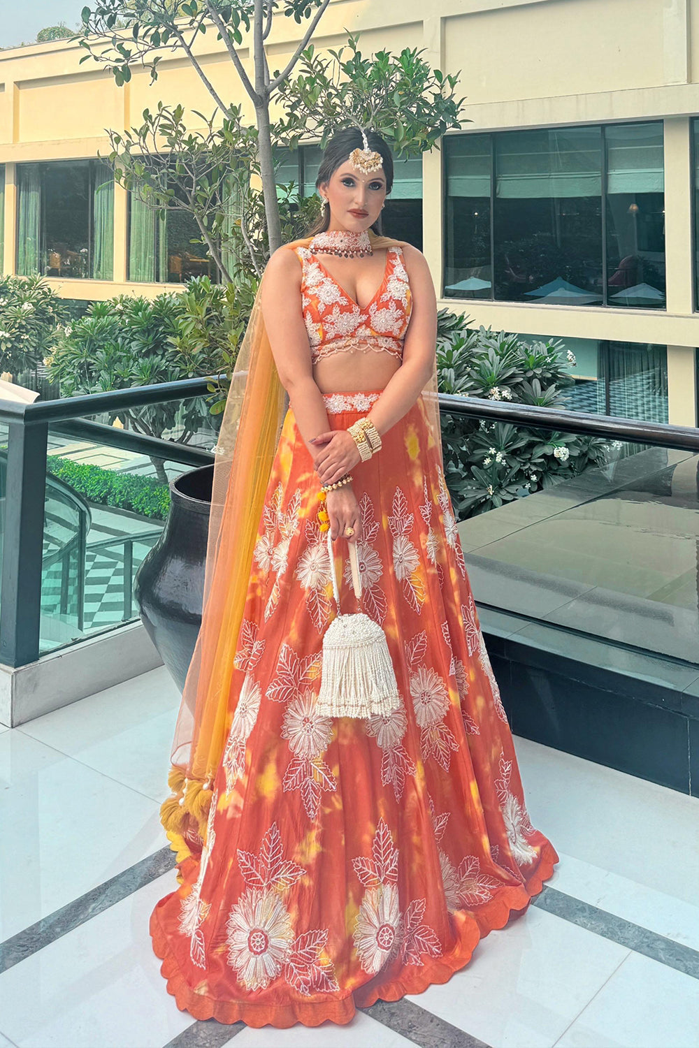 Upasana Borao in Peach- Yellow Tie-Dye Lehenga Set With Choker Dupatta