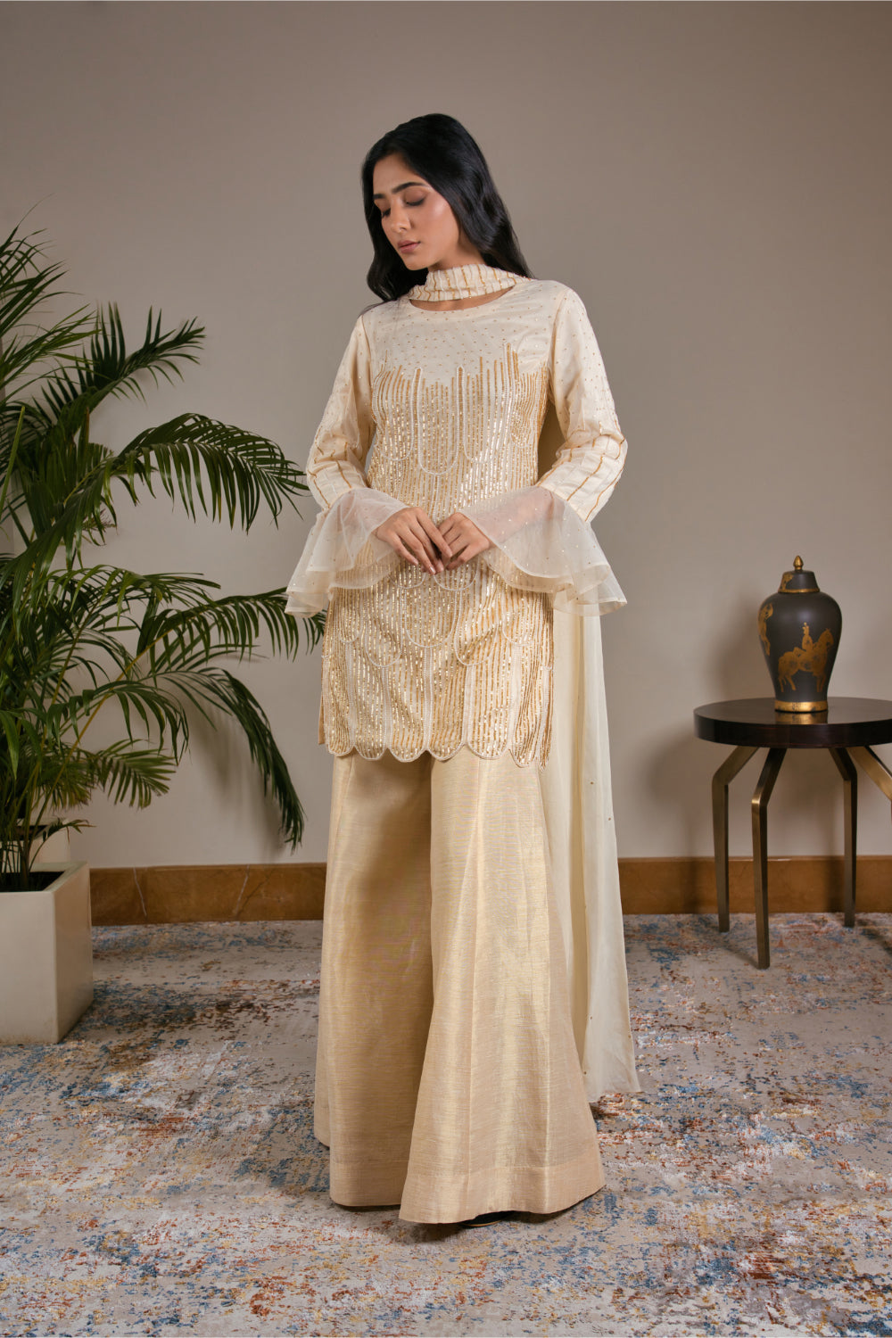 Ivory Tulle Kurti  Paired With Kasab Silk Gharara And Dupatta