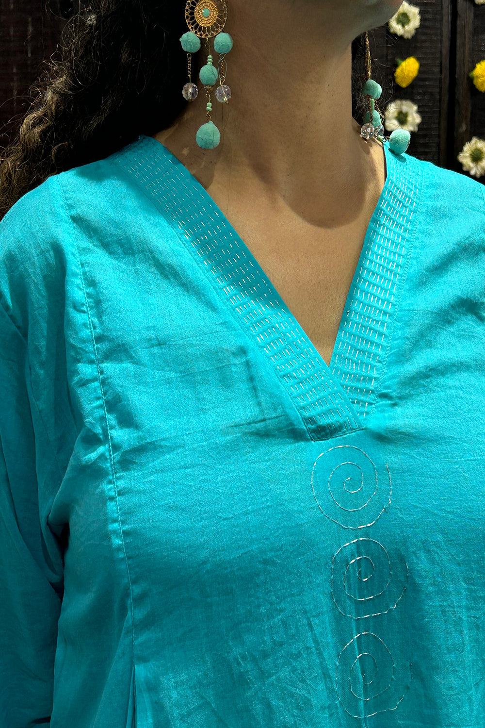 A Line Kurta In Mulmul With Handstitched Silver Thread Details.