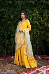 Yellow Raw Silk Kurti Paired With Chiffon Sharar And Ice Blue Tulle Dupptat